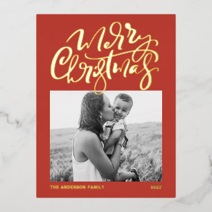 Caligrafía moderna Tarjeta roja de Navidad Foto