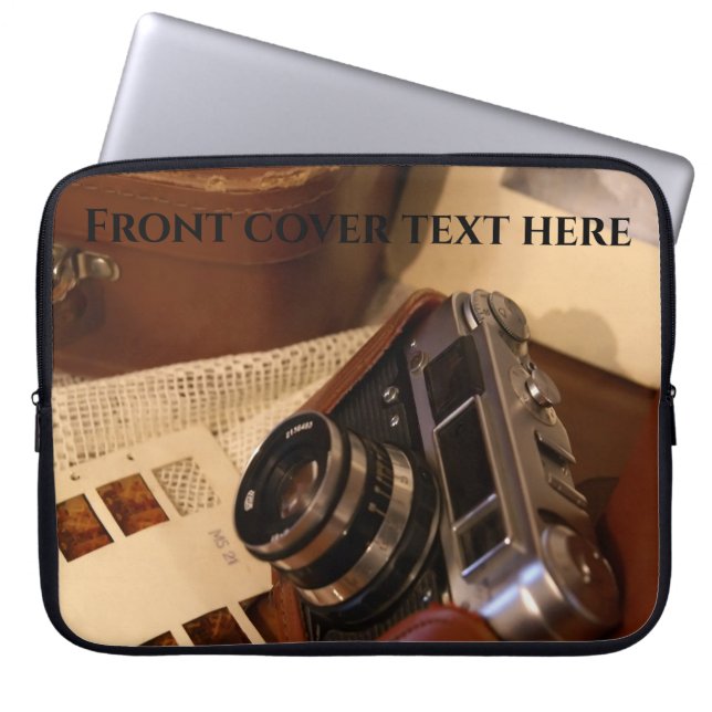 Cámara analógica vintage en funda marrón de cuero (Frente)