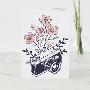 Cámara antigua con flores rosadas – Fotografía flo
