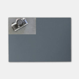 Cámara del vintage en notas de post-it de la