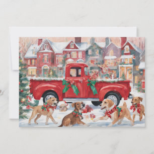 Camión rojo de Navidad en el pueblo con cachorros