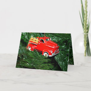 Camión rojo en árbol de Navidad