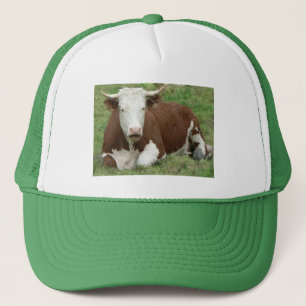 Camionero Vaca en el Gorra de hierba