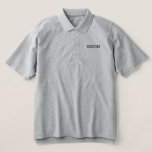 Camisa de polo clásica Mens Groom<br><div class="desc">Esta bonita camisa clásica de polo para el Groom se muestra en el color gris del cuero con letras negras bordadas. Personalizar este artículo o compra como se muestra.</div>