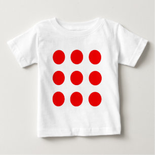 Camisa del bebé con los lunares rojos