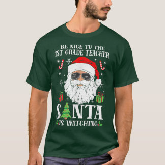 Camiseta 1st Grade Teacher Be Nice To The Teacher Santa Is 