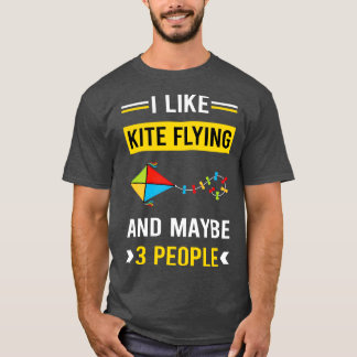 Camiseta 3 personas comen cometas voladoras