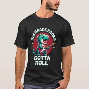 Camiseta 3er Grado Mola. Tengo que Girar Dinosaurio y Guita