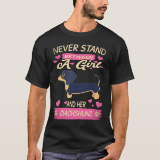 Camiseta 7 Nunca te Pongas Entre una Chica y su Dachshund