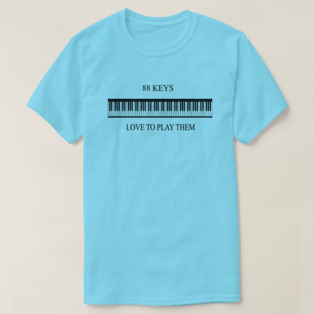 Camiseta 88 teclas Aman Jugarlas — (Diseño del anverso)