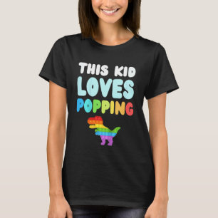 Camiseta A Este Niño Le Encanta Comprar Juguetes Fidget Nov