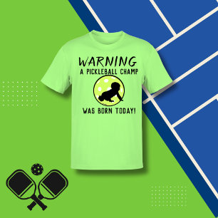 Camiseta ADVERTENCIA A Un Campeón De Pickleball Nacido Hoy 