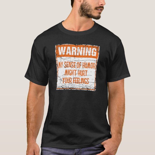 Camiseta Advertencia: Mi sentido del humor puede herir tus  (Anverso)