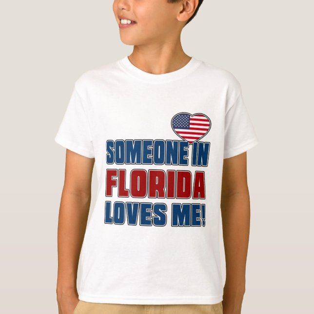 CAMISETA ALGUIEN ME AMA EN LA FLORIDA (Anverso)