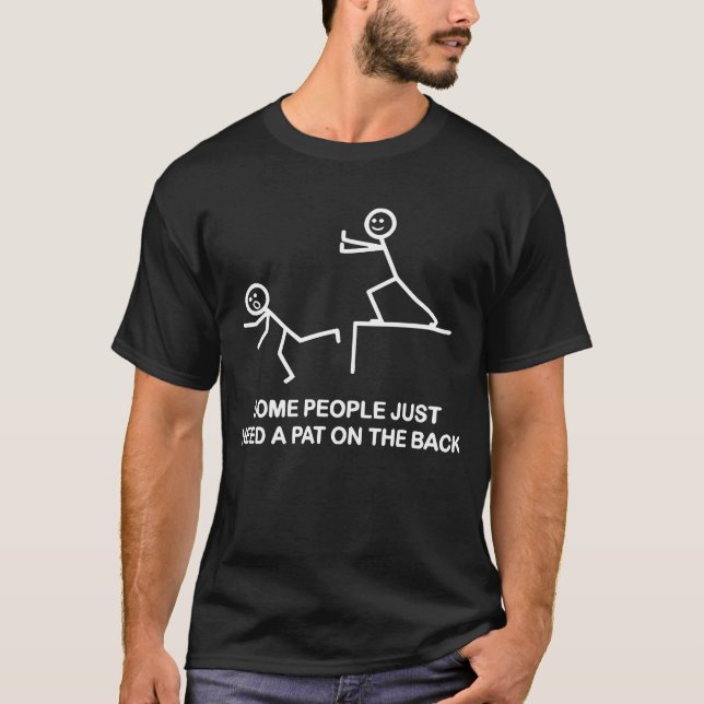Camiseta  Algunas Personas Sólo Necesitan Una Patada En La  (Anverso)