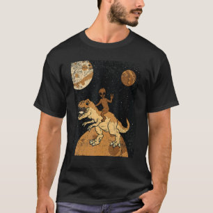 Camiseta Alien montando dinosaurio negro historia mes diver