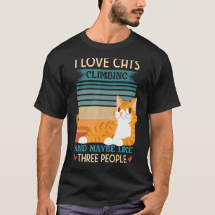 Camiseta Amo a los gatos subiendo y quizás como tres person