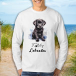 Camiseta Amo A Mi Labrador - Perro Cachorro<br><div class="desc">¡Presentamos la adición perfecta a cualquier guardarropa de amante de los perros! Nuestra camiseta "I Love My Labrador" presenta una impresionante imagen acuarela de un cachorro recién recuperado del labrador negro, con un diseño de cardíacas y de huellas de pata lindo y moderno. Ya sea que seas una orgullosa madre...</div>