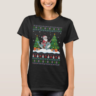 Camiseta Árbol de Narwhal de Santa Riding ilumina a Navidad
