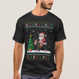 Camiseta Árbol de Navidad feo ilumina el simio de Santa Rid
