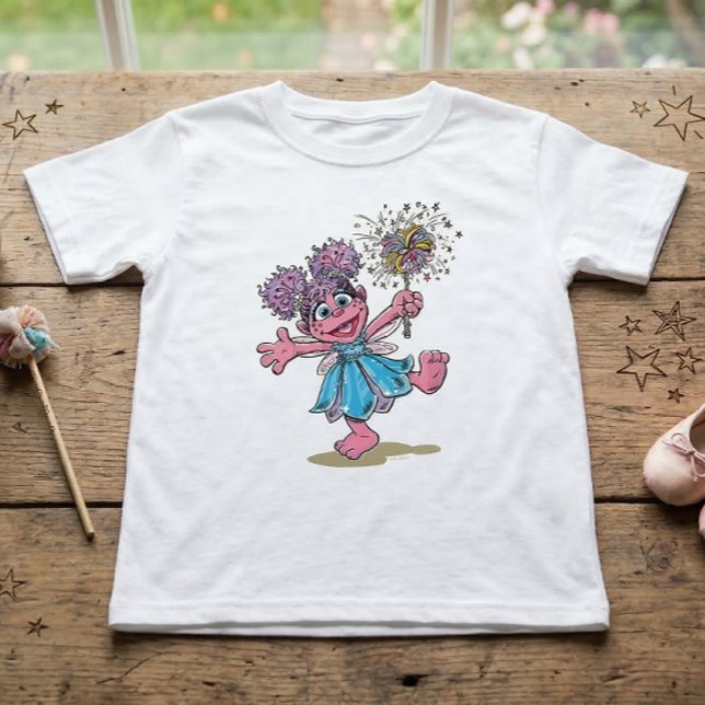 Camiseta Arte retro de Abby Cadabby de Sesame Street (Generated image of t-shirt on table)