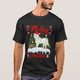 Camiseta Ártico Wolf Merry Christmas Tree iluminó la pared