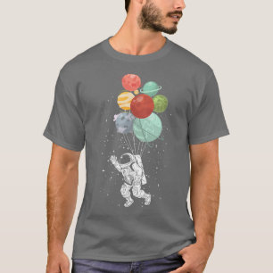 Camiseta Astronauta sostiene globos planetarios místicos es