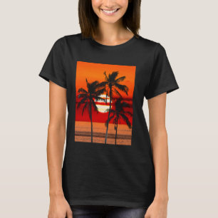 Camiseta Atardecer tropical dorado con palmeras de silueta