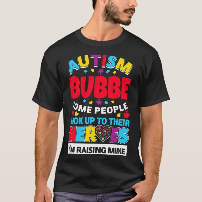 Camiseta Autismo Bubbe La Gente Busca A Sus Héroes Subiendo (Anverso)