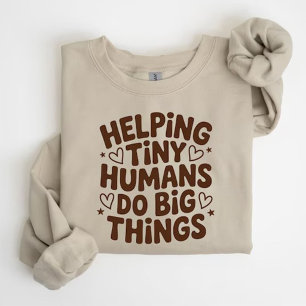 Camiseta Ayudando a Pequeños Humanos a Hacer Grandes Cosas