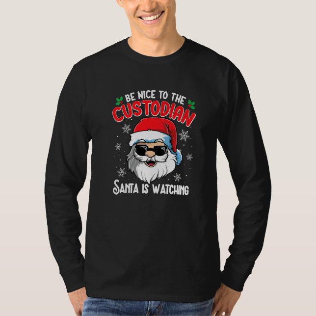 Camiseta Be Nice To The Custodian Santa Is Watching  Christ (Anverso)