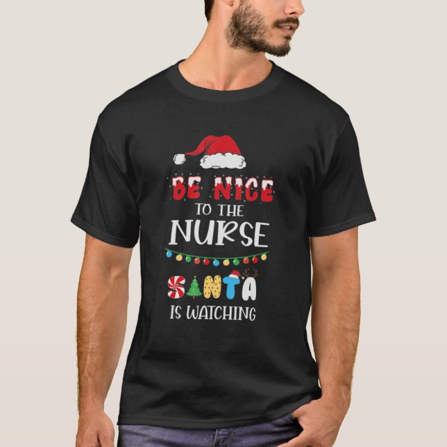 Camiseta Be Nice To The ER Nurse Santa Is Watching Nursing  (Anverso)