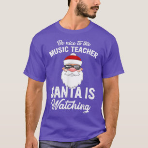 Camiseta Be Nice To The Music Teacher Santa Is Watching Xma