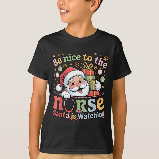 Camiseta Be Nice To The Nurse Santa Is Watching Christmas X (Anverso)