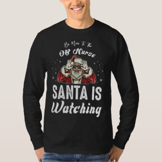 Camiseta Be Nice to The OB Nurse Santa Is Watching  Christm