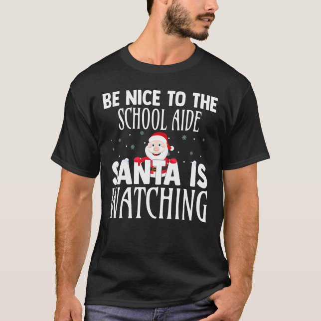 Camiseta Be Nice To The School Aide Santa Is Watching Funny (Anverso)