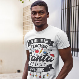 Camiseta Be nice to the teacher Santa is watching Christmas