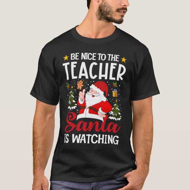 Camiseta Be Nice To The Teacher Santa Is Watching Teacher C (Anverso)