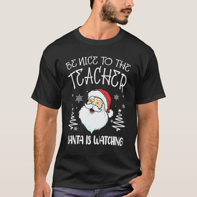Camiseta Be Nice To The Teacher Santa Is Watching Teacher C (Anverso)