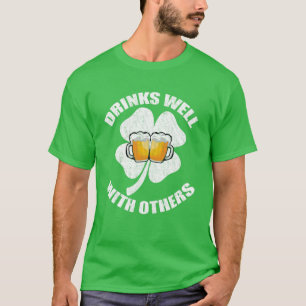 Camiseta Bebe bien con otros verdes