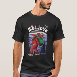Camiseta Believe Bigfoot Sasquatch Yeti Santa Hat Navidades
