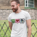 Camiseta Bienes de amor por la paz<br><div class="desc">Regalos inmobiliarios de bonito para un inmueble,  una compañía de títulos,  un corredor hipotecario,  un funcionario de préstamos o incluso un nuevo propietario. Una señal de paz,  un corazón y una casa.</div>