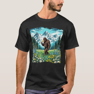 Camiseta Bigfoot camina en bosque de campo de flores sasqua