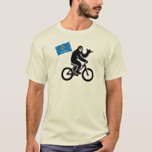 Camiseta Bigfoot en bicicleta con la bandera de Oklahoma