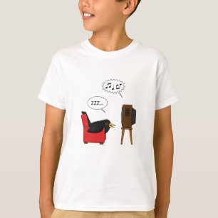 Camiseta Blackbird durmiendo frente al cómic de la TV