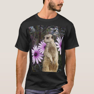 Camiseta Bloom Curioso: Meerkat entre margaritas moradas