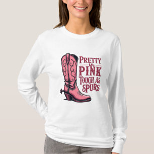 Camiseta Bonito en masa rosada mientras empuja a las vacas