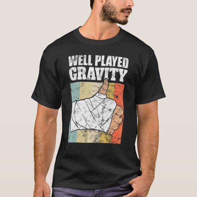 Camiseta Brazo Roto   Buena Jugada Gravedad (Anverso)