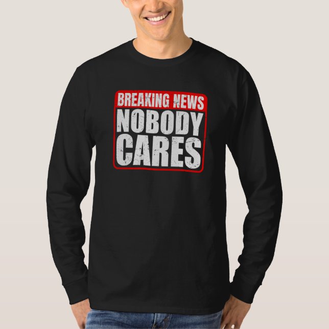 Camiseta Breaking News  Nobody Cares        (Anverso)