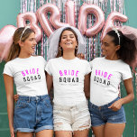 Camiseta Bride Squad | Hot Pink Bachelorette Bridesmaid<br><div class="desc">Cute, simple, stylish "Bride Squad" quote art womens t-shirt with modern, minimalist typography in black and hot neon pink in a cool trendy style. The slogan, name and role can easily be personalized with the names of your bridal party, for example, bride, bridesmaids, flower girls, Mother of the Bride, Glam...</div>